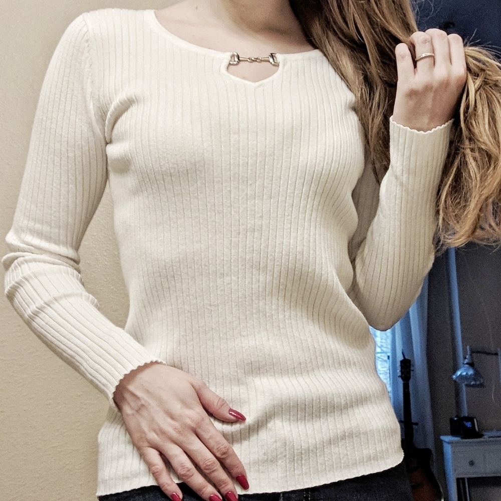 Soft cream sweater with neck detail